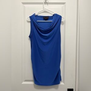 A purplish blue feminine business shirt.